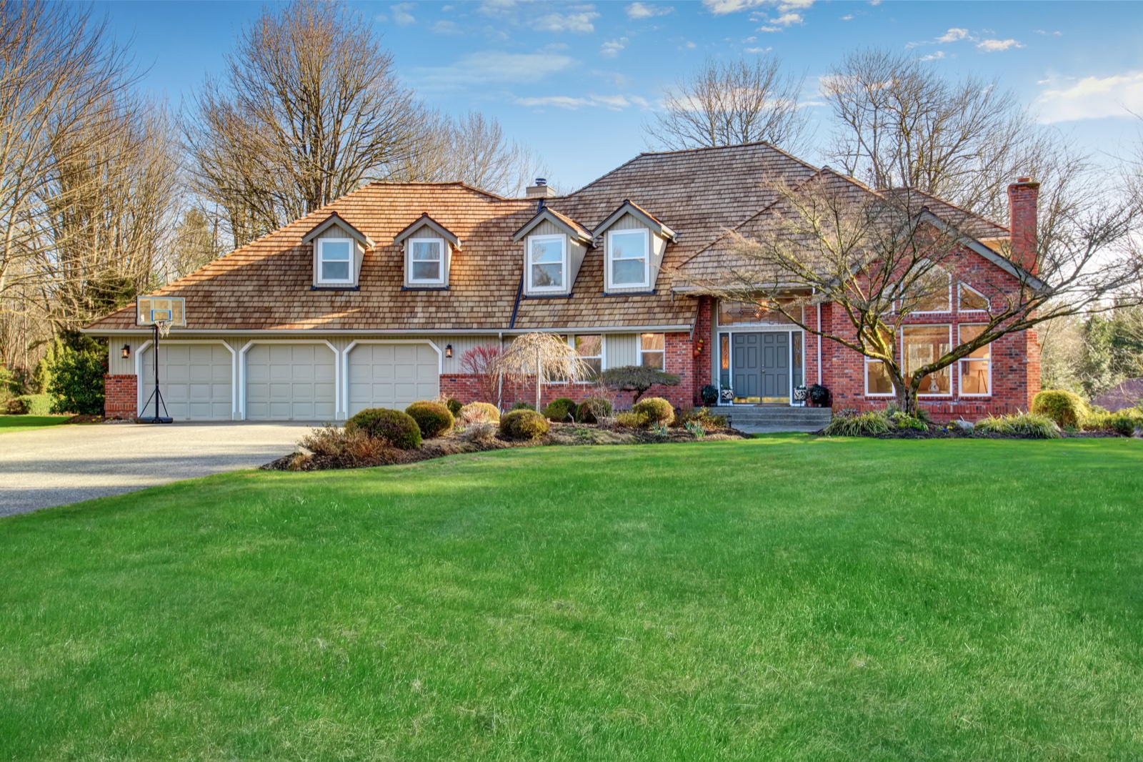 Traditional brick home with cedar shake roof in Barrington, IL